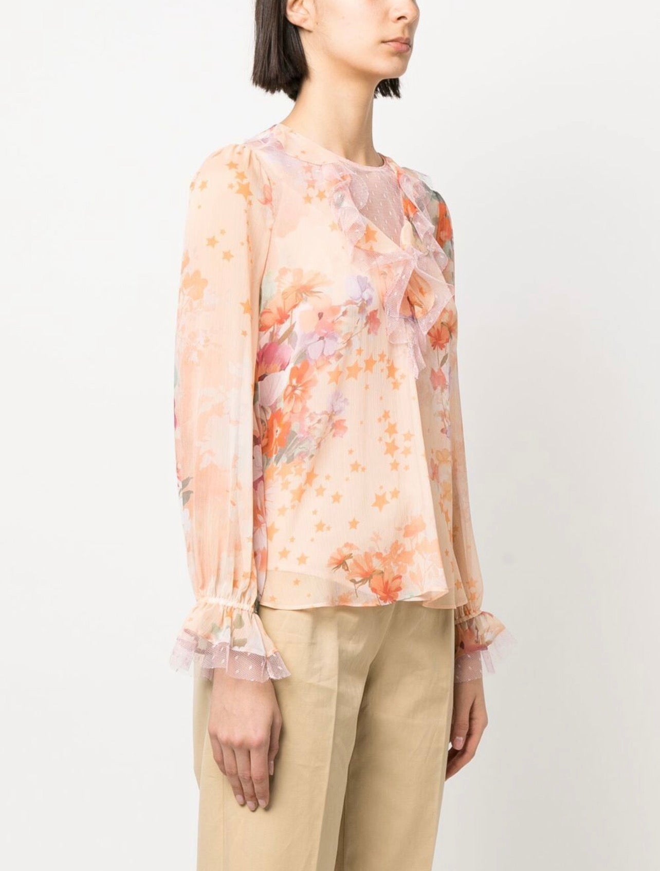 Ruffled floral and star-print blouse
