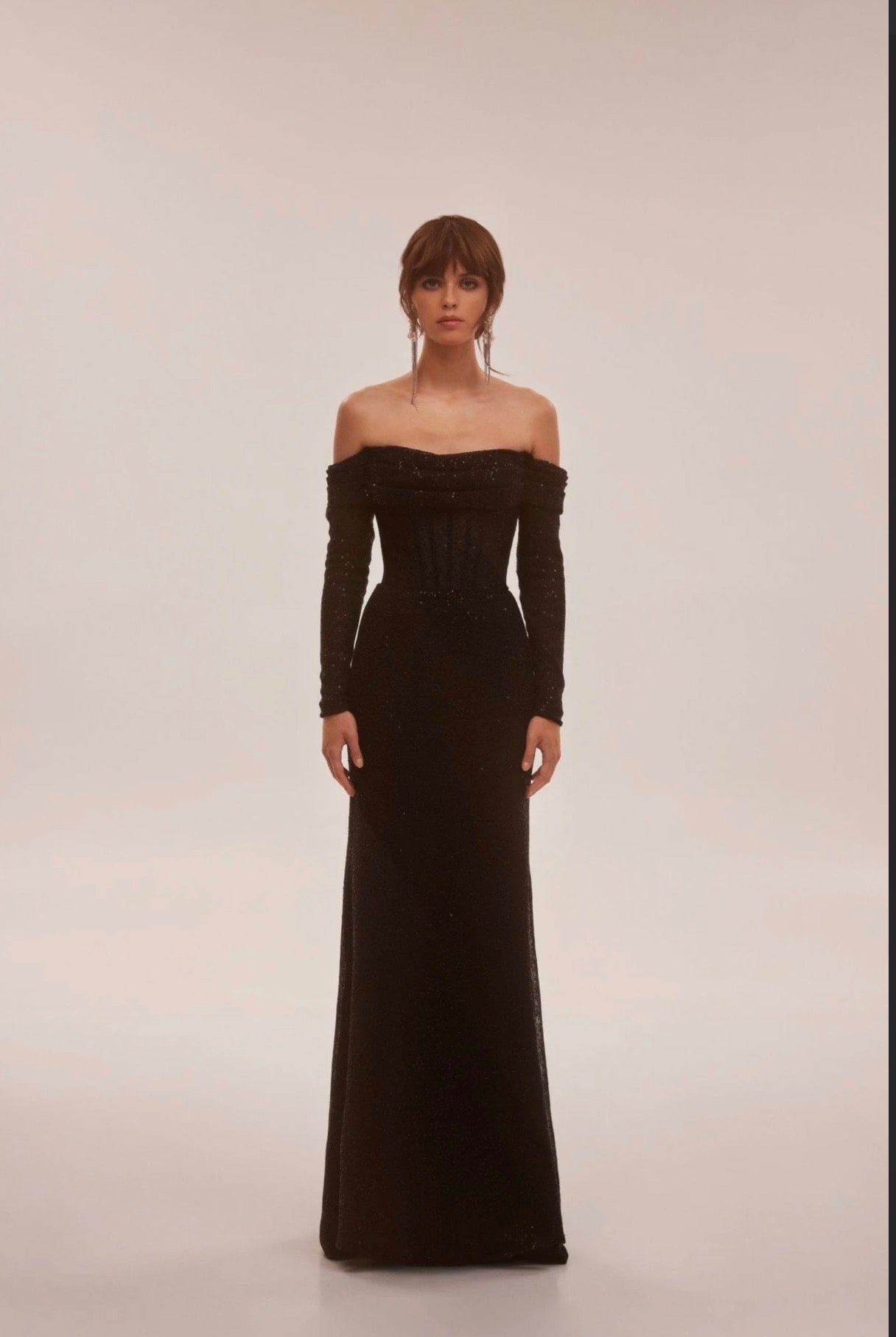 Elegant black off-the-shoulder sparkling maxi dress